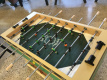 2.0129 (ref 2.0129) 2de hands groene tafelvoetbal Jupiter 7*